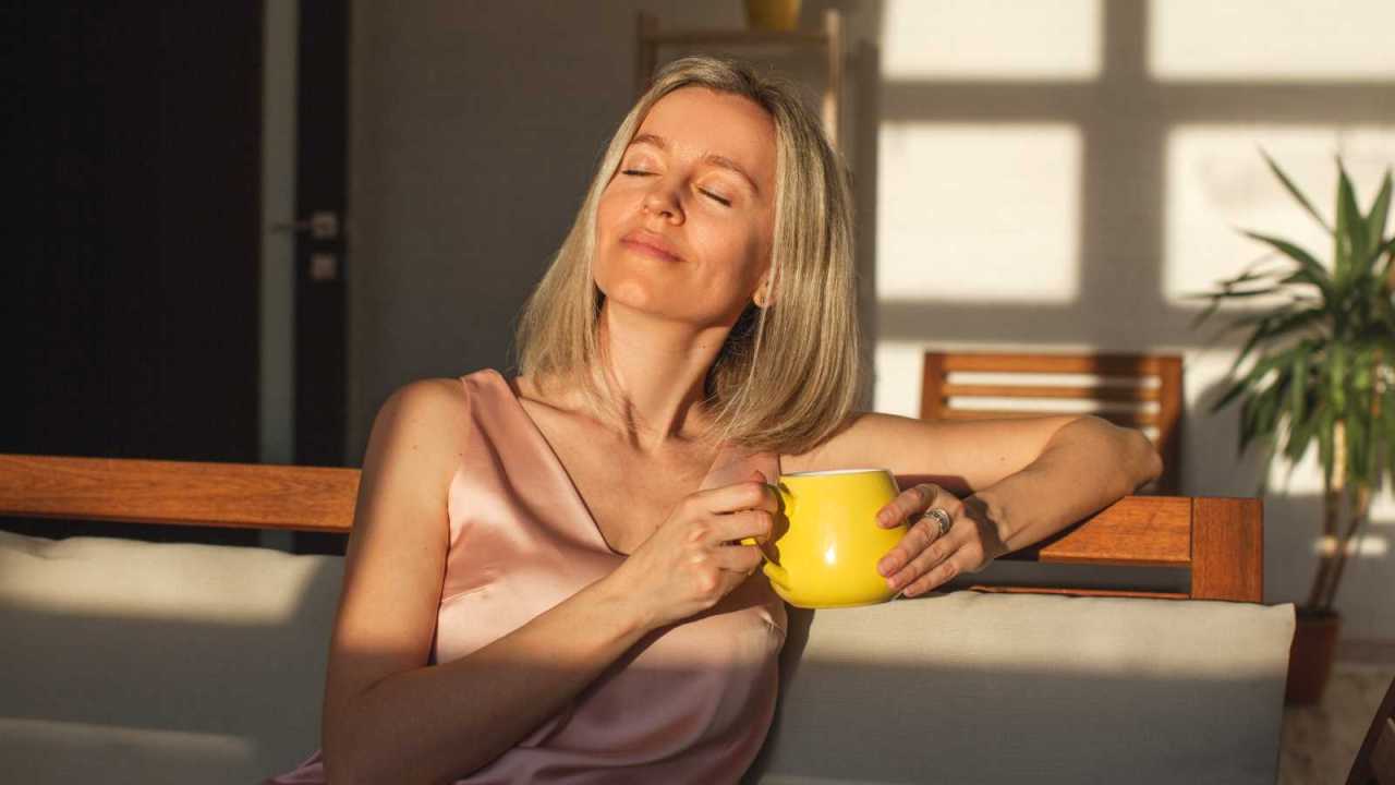 happy woman waking up early in the morning.