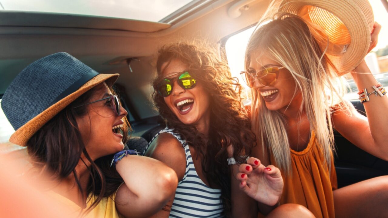 Female friends enjoying road trip