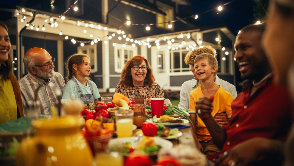 Family Laughing around a table